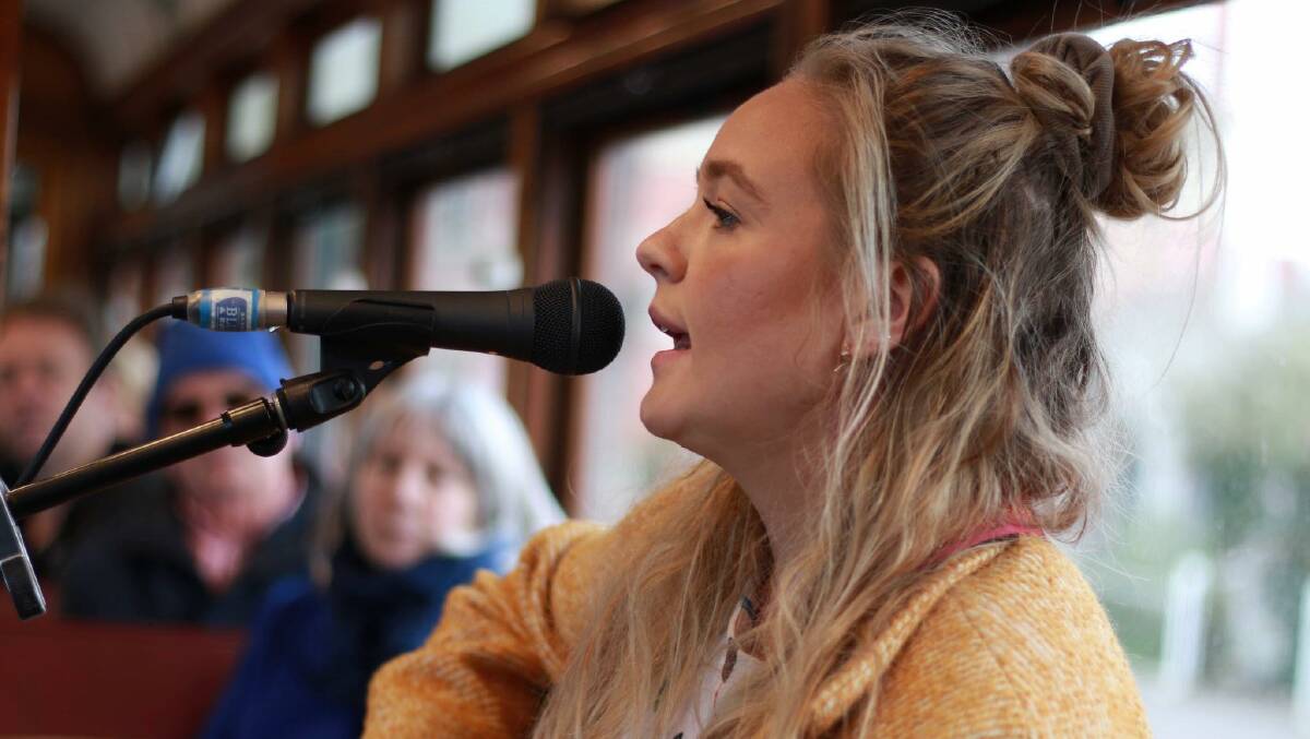 Sarah Wilkinson performs on The Blues Tram. Photo by Jayd Ingles
