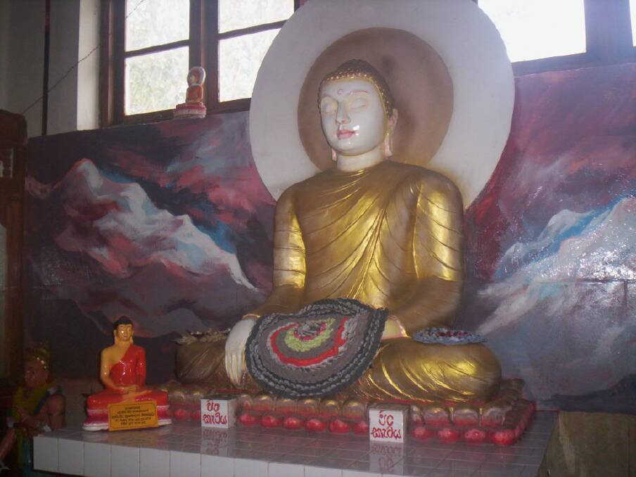 DISCOVERING A NEW CULTURE: A statue in a Buddhist temple, snapped during Gloria Meltzer's overseas visit. Picture: SUPPLIED
