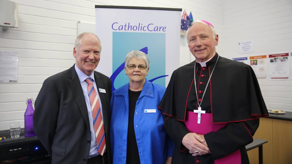NEW LOOK: Peter Richardson, Kath Tierney and Bishop Leslie Tomlinson celebrate CatholicCare Sandhurst's new beginning, with the hopes more people in need will use the service.