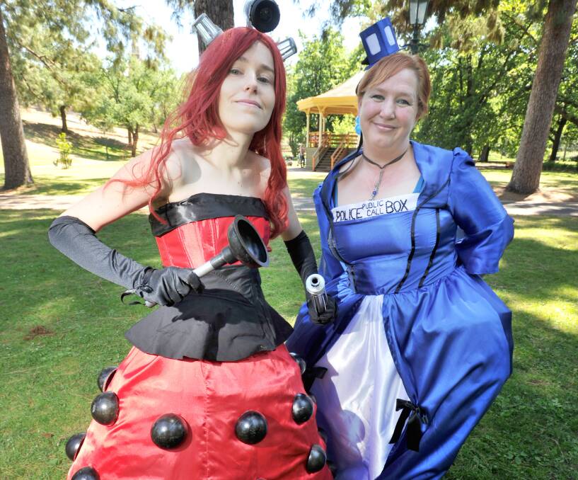 CULT FANS: Kara Harris and Sue Lawson, dressed as a dalek and the TARDIS respectively, made their own Dr Who-themed outfits. Picture: NONI HYETT
