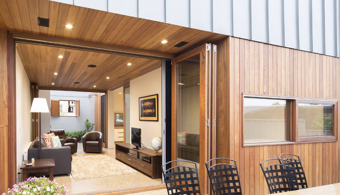 GO WITH THE FLOW: You can blend old and new styles throughout your home, even when updating the exterior. Don’t be afraid to mix things up when you renovate and make the space yours. Image: Todd Newman Builders.


