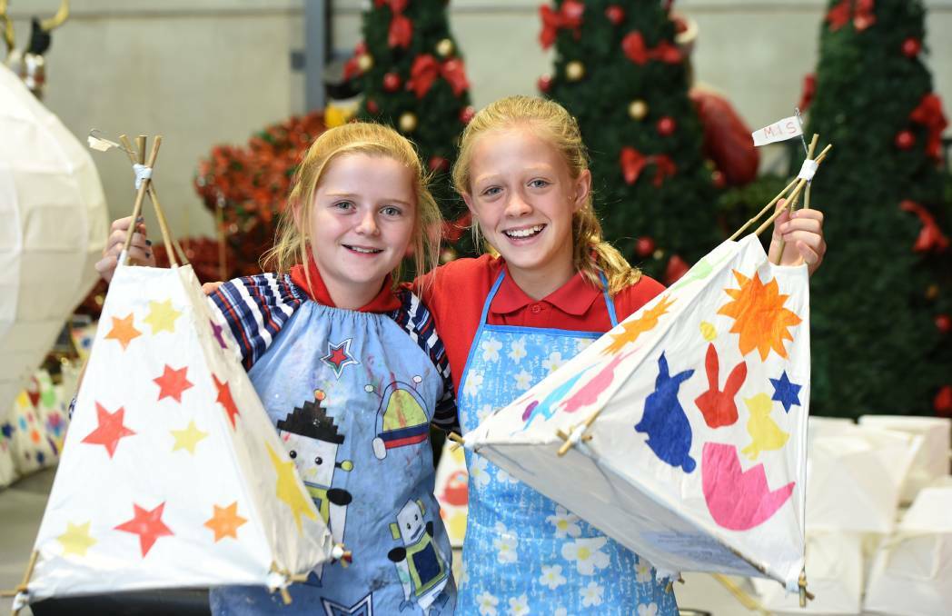 SCHOOL HOLIDAYS: Emily and Jess participate in an artistic workshop. Pictures: JODIE DONNELLAN