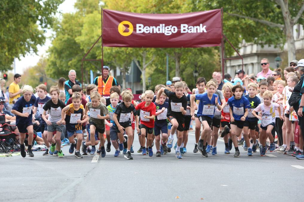 ON YOUR MARKS: Children get ready to race in the 2019 Dragon Mile. Picture: GLENN DANIELS