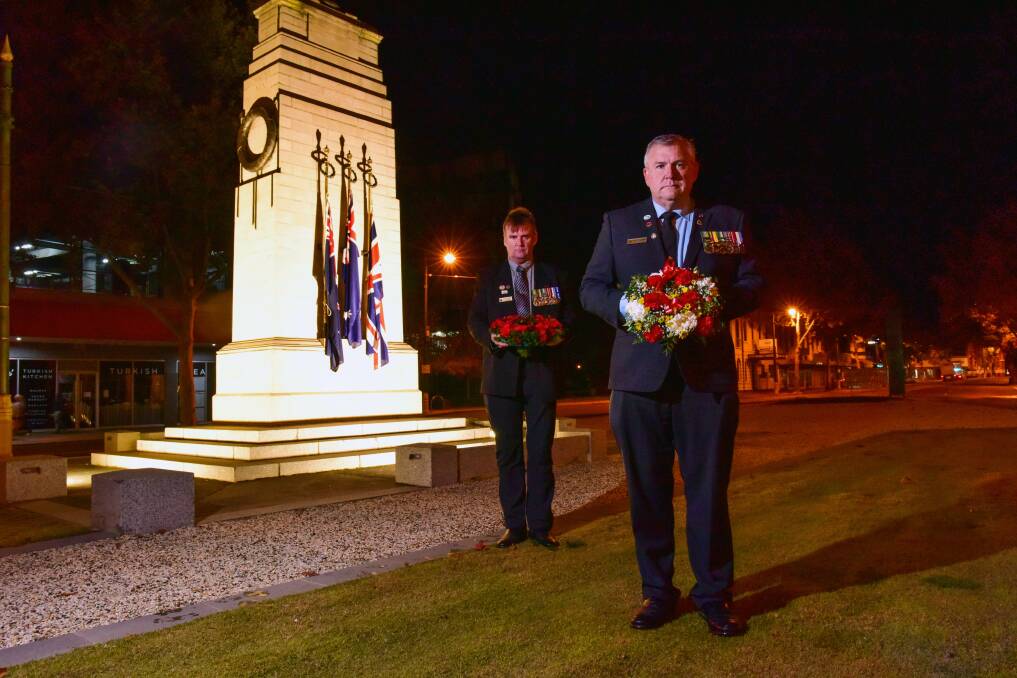 PAYING RESPECTS: Committee member Glenn Ludeman and Bendigo RSL President Peter Swandale at the 2020 dawn service. Picture: BRENDAN McCARTHY