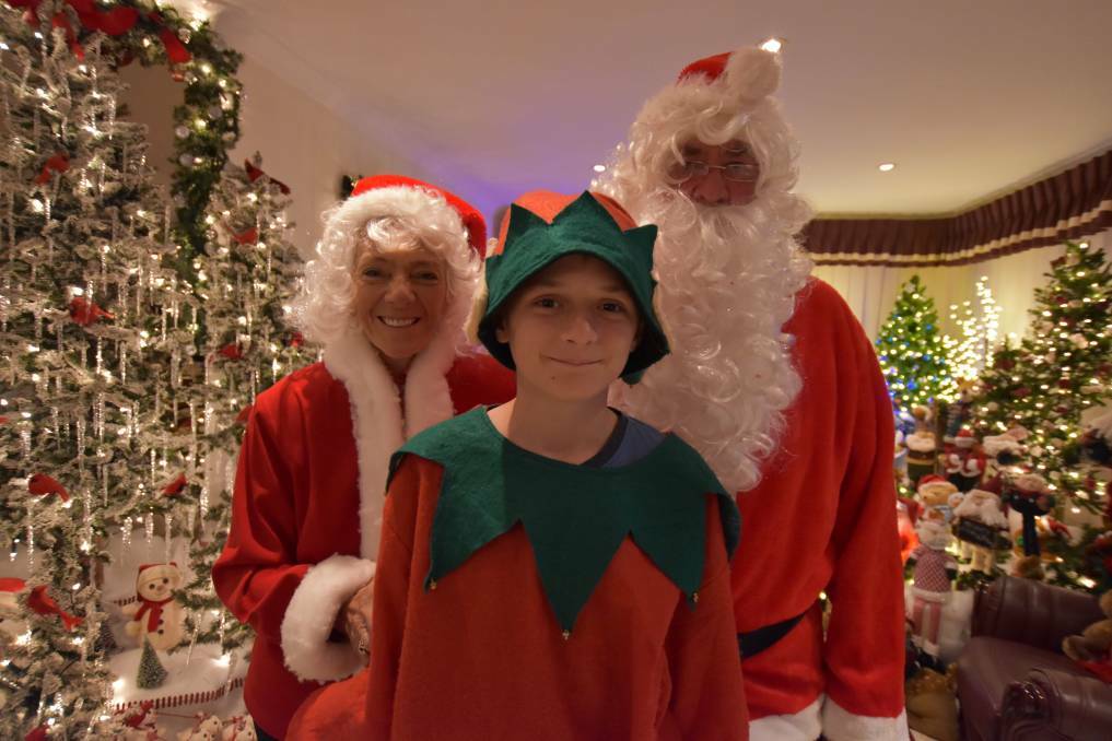 Christmas Elf and Santa. Picture: SUPPLIED. Click image for full story. 