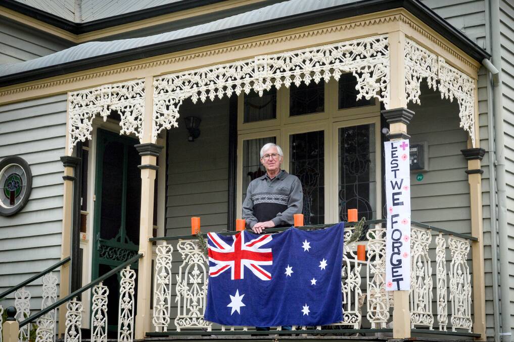VIGIL: Frank Fenwick was one of a number of residents to commemorate Anzac Day with a quiet dawn vigil in his street in Bendigo 2020. Picture: BRENDAN McCARTHY
