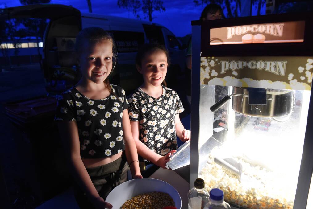 Outdoor cinema fun with Kayla Manning and Olivia Friswell. Picture: JODIE DONNELLAN 