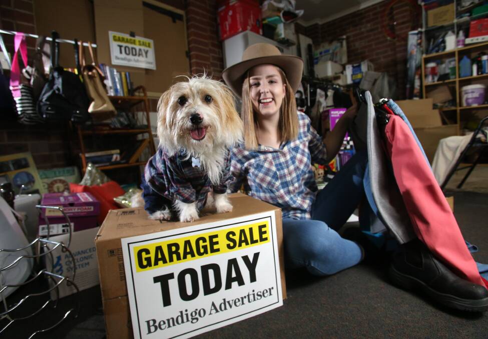 READY TO HELP: Millie Hawkins is raising funds for farmers and is calling for donations ahead of a garage sale. Her dog Ottis is helping out too. Picture: GLENN DANIELS 2018.