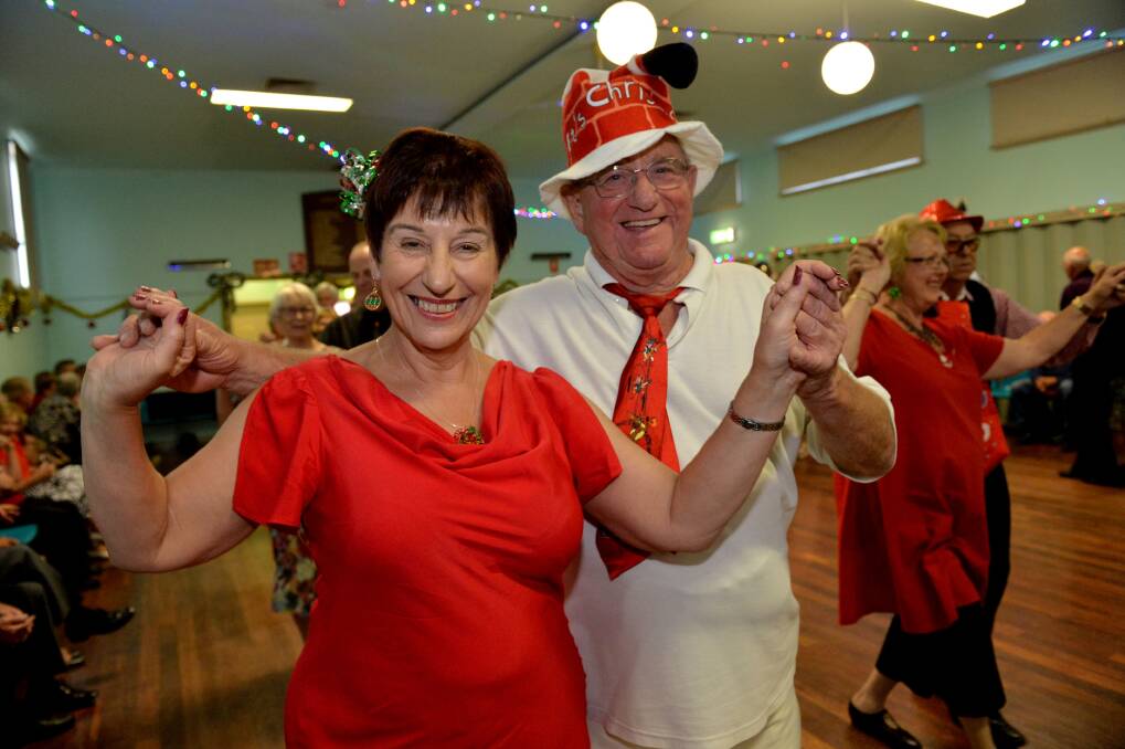 DANCING FUN: Spring Gully Dance Christmas Party. Ann Mason and Clive Niemann. Picture: JODIE DONNELLAN