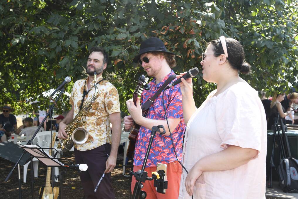 PERFORMING: Musicians keep crowds entertained at markets. Picture: NONI HYETT