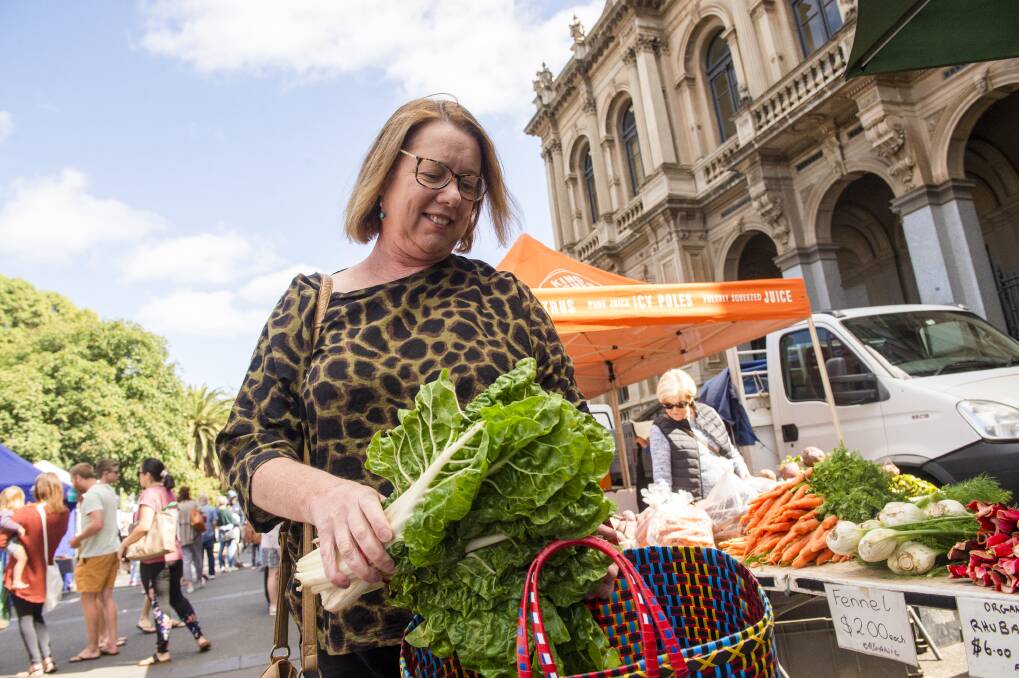 FRESH PRODUCE: Kate Grundy at the first farmers market of the year at Sidney Myer Place in January. Picture: DARREN HOWE