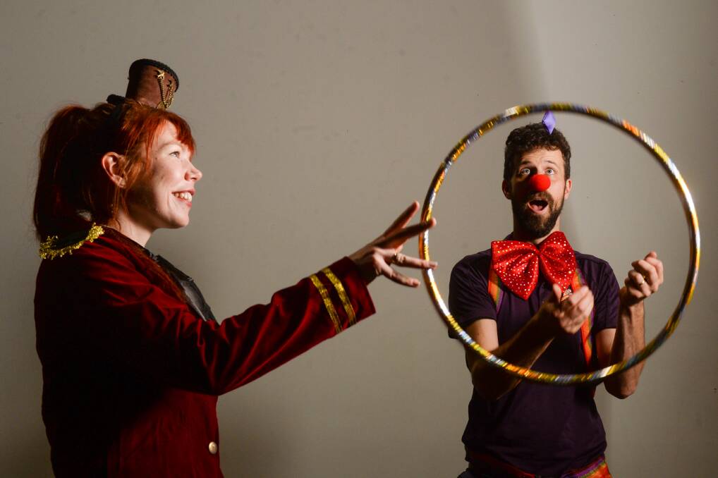 SCIENTIFIC: David Holmes and Alissa Van Soest from The Discovery Science & Technology Centre, exploring the science behind the circus for their summer program. Picture: DARREN HOWE