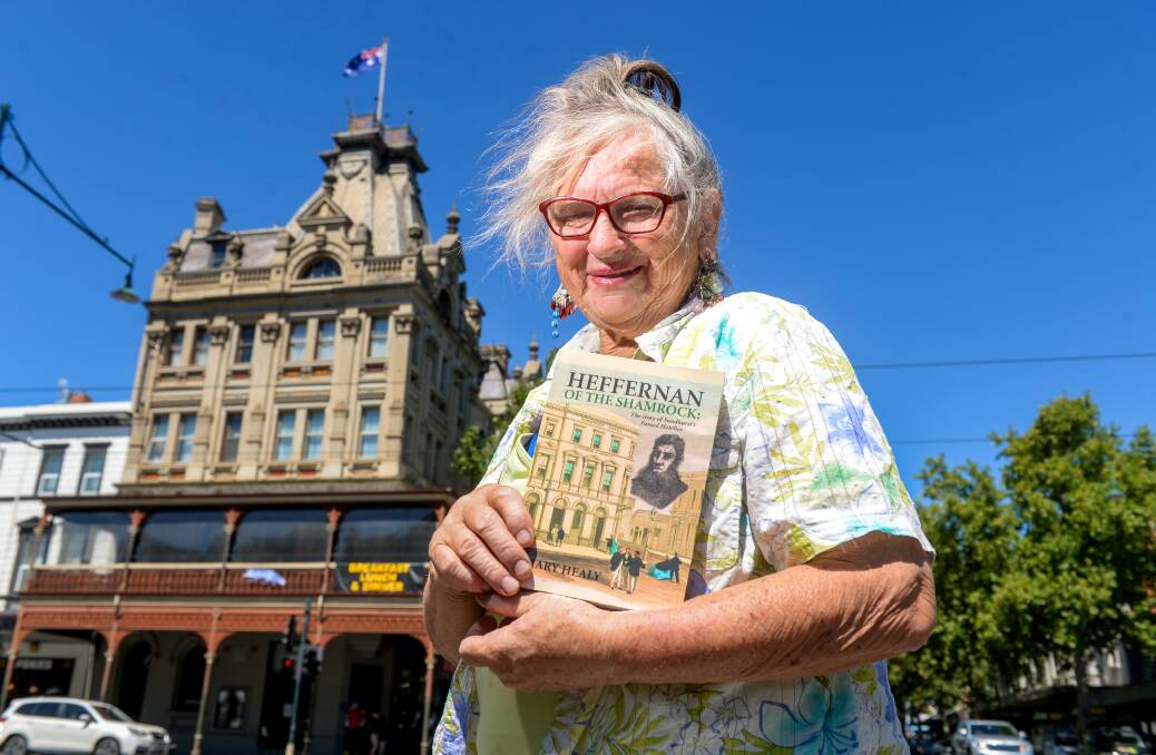 UNEARTHING HISTORY: Author, Mary Healy, with her new book. Picture: DARREN HOWE
