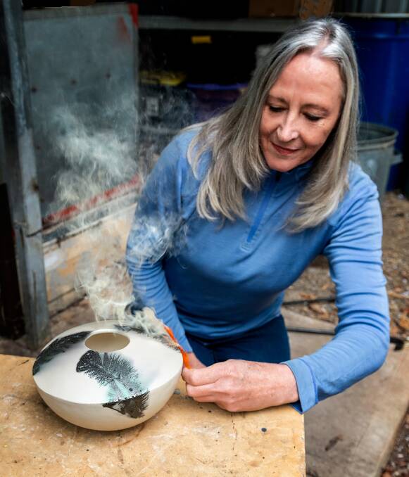 CREATIVE: Ceramic artist Ri Van Veen creating work Burning Feathers. Picture: SUPPLIED 