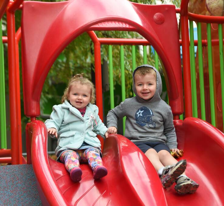FUN TIMES: Gemma and Mitchell Elliott play on the Hargreaves Mall playground, Fun Loong, 2015. Picture: JODIE DONNELLAN