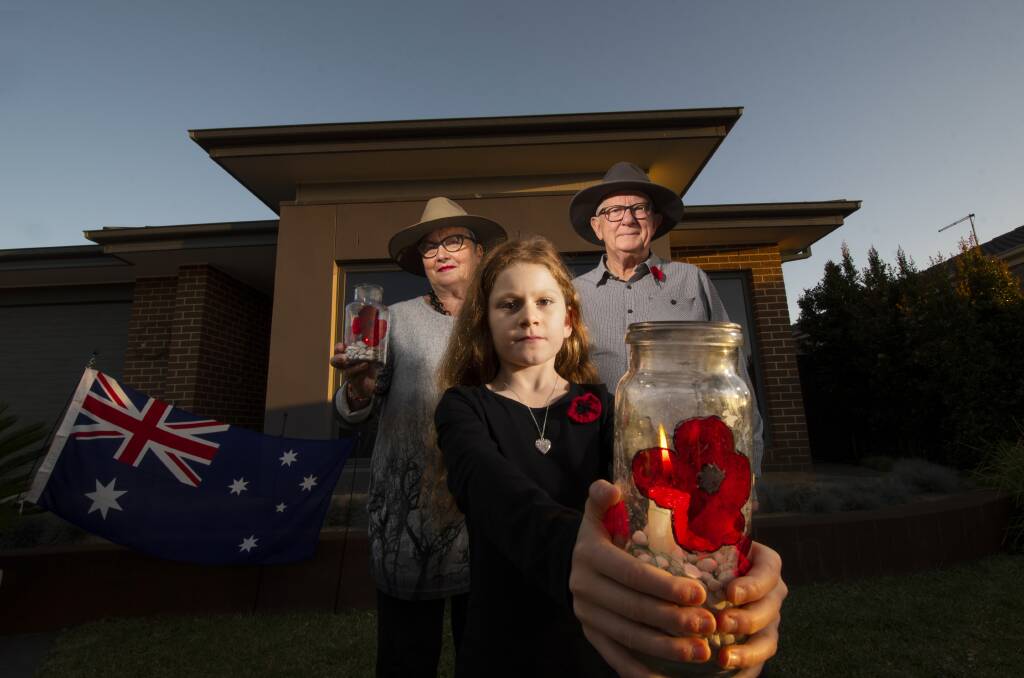 CHANGE TO SERVICES: Heather Watson and neighbours marked Anzac Day from the end of their driveaway because no one was able to attend the dawn service. Image from 2020. Picture: DARREN HOWE