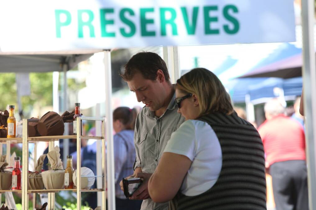 BUY AND SELL: Community members head out to the Bendigo Farmers' Market in 2014. Picture: GLENN DANIELS. 