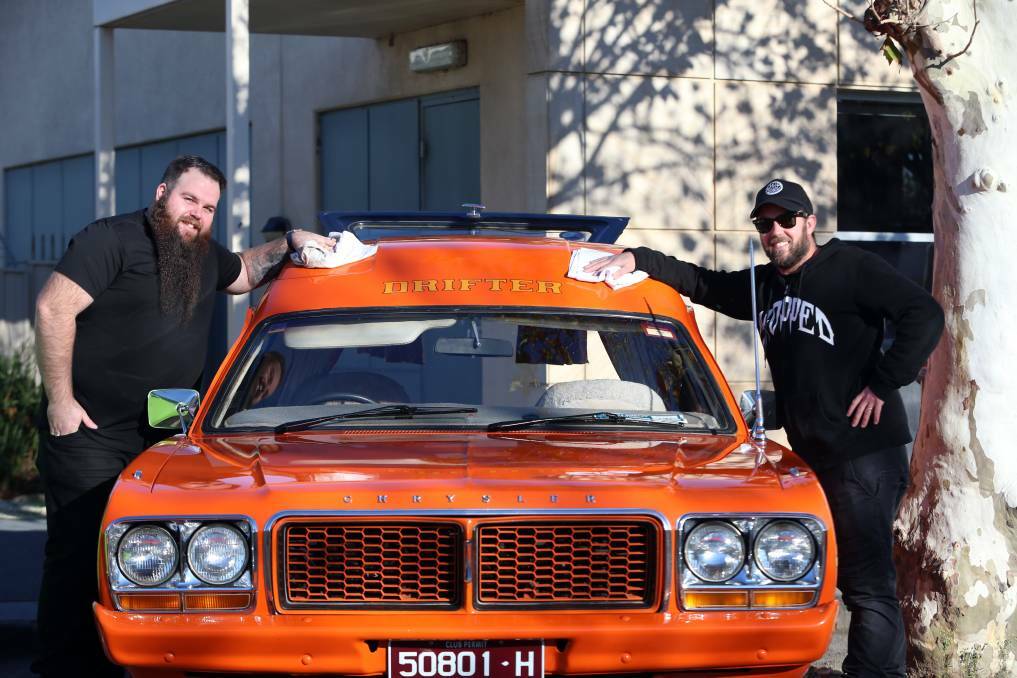 Lloyd and Ryan Bond with their pride and joy. Picture: GLENN DANIELS