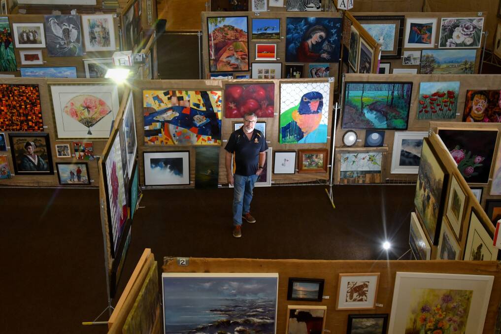 ART ON DISPLAY: Graeme Clarke with The Rotary Art Show in 2021. Picture: NONI HYETT