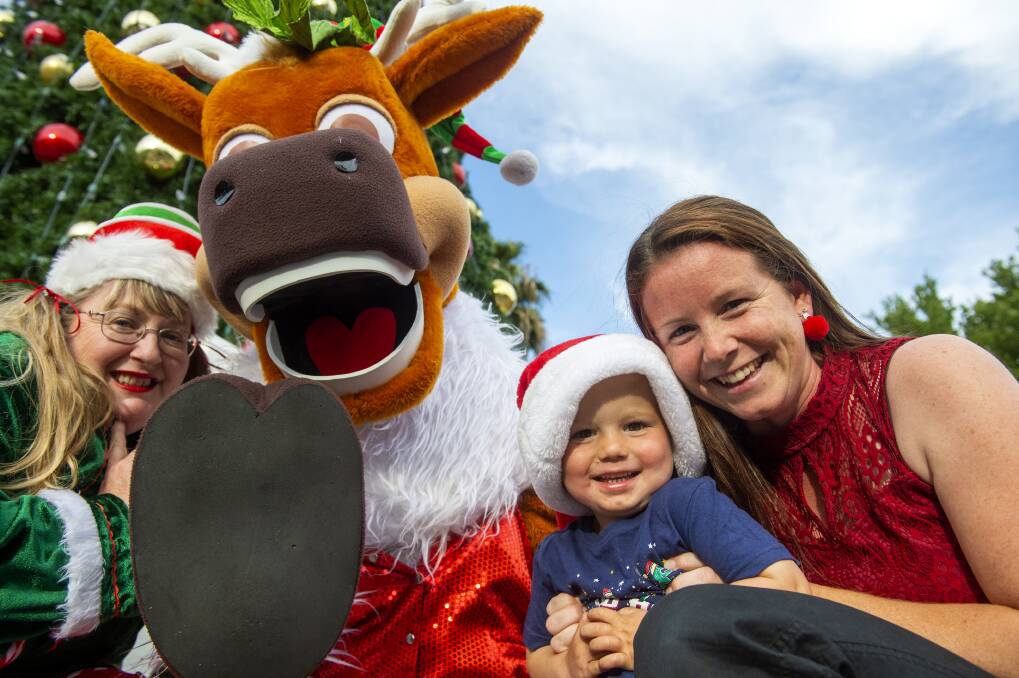 FESTIVITIES: Ryan Bourke and mum Bianca Bourke with Cupid the Reindeer celebrating Christmas. Picture: DARREN HOWE