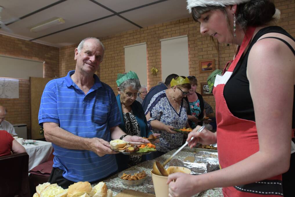 Community of Christ, Christmas Lunch event. Des Woodward and Kristy McIlroy. Picture: NONI HYETT 