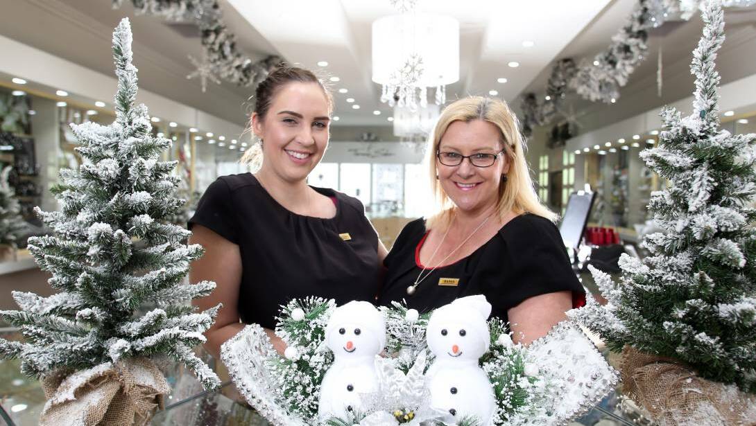 MERRY AND BRIGHT: Alisha Latimer and Tania Smith from JM Leech Jewellers launch Twinkle Twinkle for local shopping. Picture: GLENN DANIELS 2015