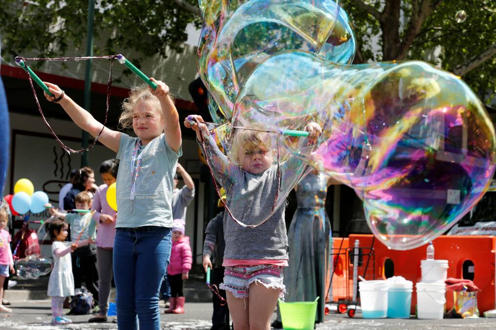 Alexis and Melissa Chadwick try their hand at a new skill, Funloong Fun Day 2018. Picture: EMMA D'AGOSTINO
