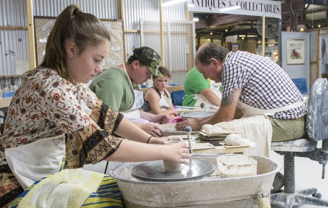 POTTERY: Brylie Shepard was one of many taking up workshops at Bendigo Pottery in 2019. Picture: DARREN HOWE