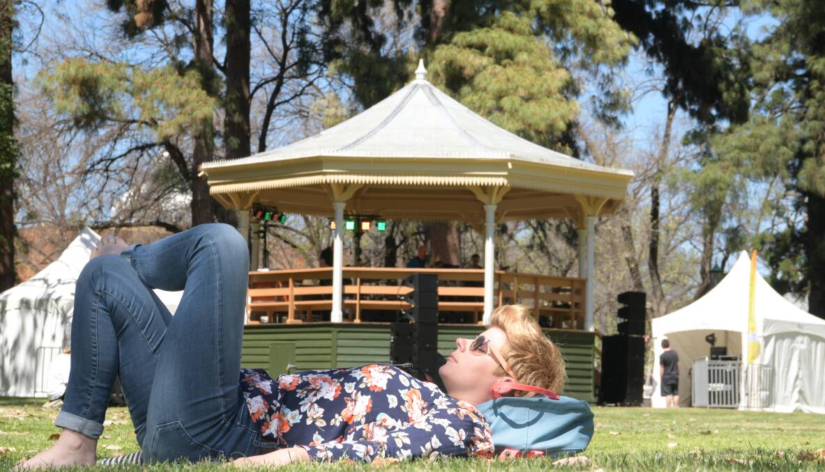 SUMMER TIME: Miriam Rystedt takes a break in the scenic Rosalind Park. Picture: NONI HYETT