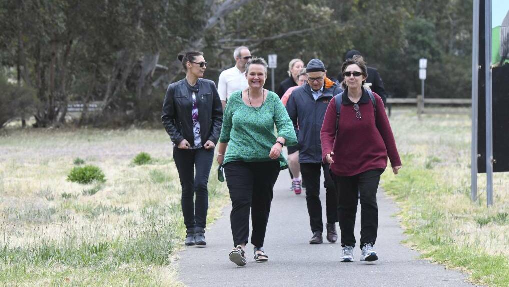 READY TO WALK: Community members get active together. Picture: NONI HYETT