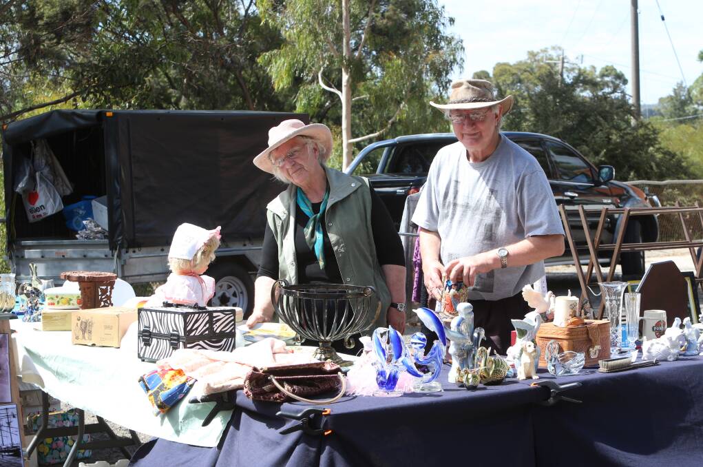 LOTS OF WARES: Ros and Colin Cartwright showcase their items. Picture: PETER WEAVING