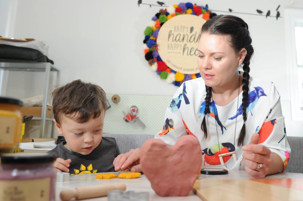 HOMEMADE: Happy Hands Happy Heart owner Emma Clohesy, with son George, will be selling her playdough at The Creators Market. Picture: NONI HYETT.