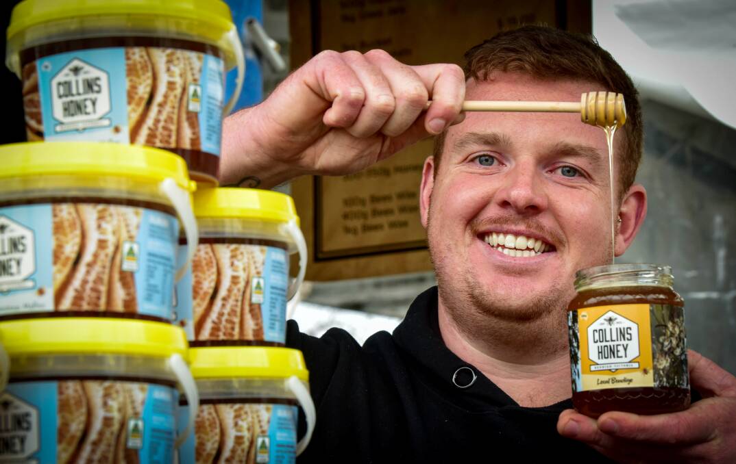 FRESH PRODUCE: Richard Collins of Collins Honey at the Bendigo farmers market. Picture: BRENDAN McCARTHY