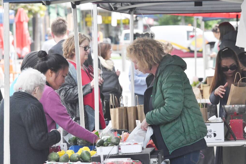 BARGAINS: Community members attend the Marong Market. Picture: DARREN HOWE