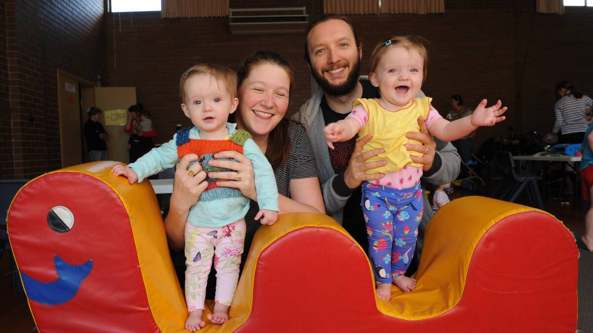 Alice and Rohan Adam with their twins Heidi and Amelia at the regular Bendigo Multiple Birth Association playgroup. Picture: NONI HYETT 