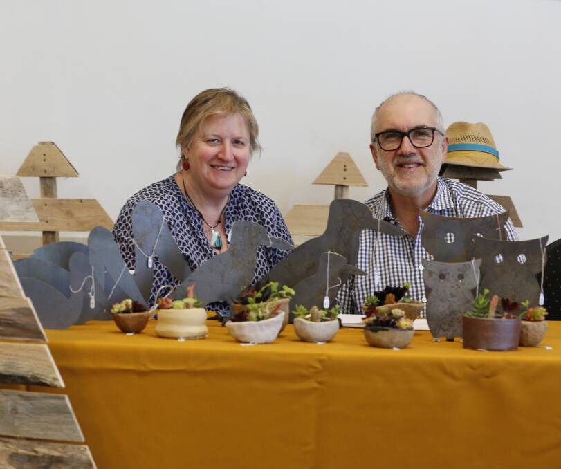 ARTS AND CRAFTS: Karen Crook and Kevin Simpson at a local market in 2018. Picture: EMMA D'AGOSTINO