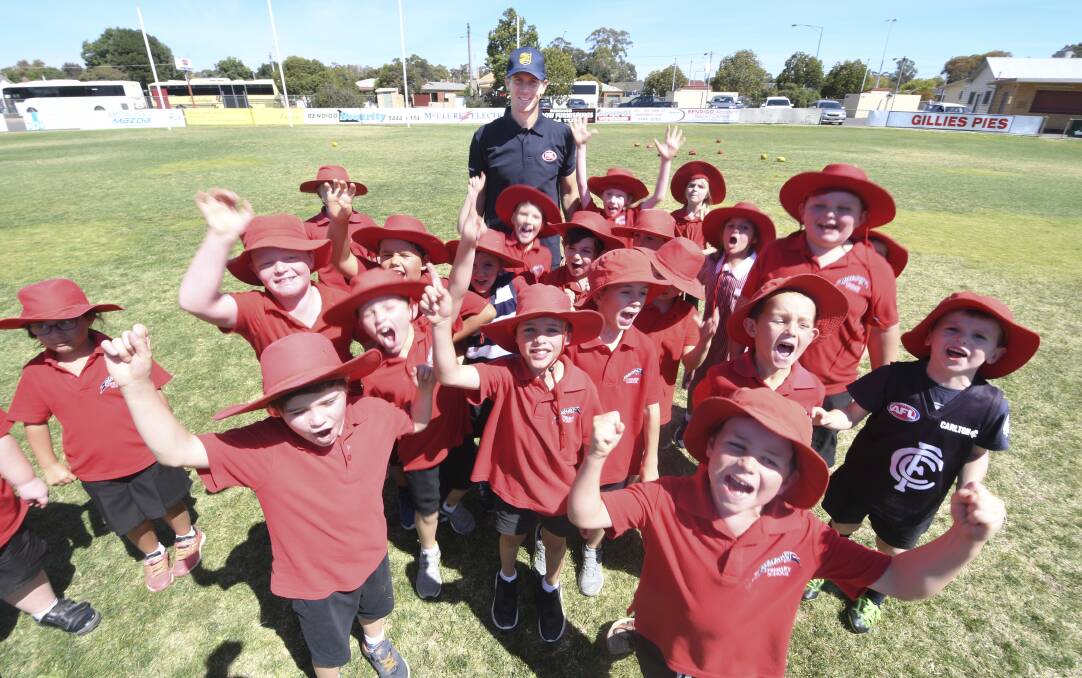 Students from Marong Primary School took part in NAB AFL Auskick's mega clinic 2018, with Nick Dal Santo. Picture: NONI HYETT