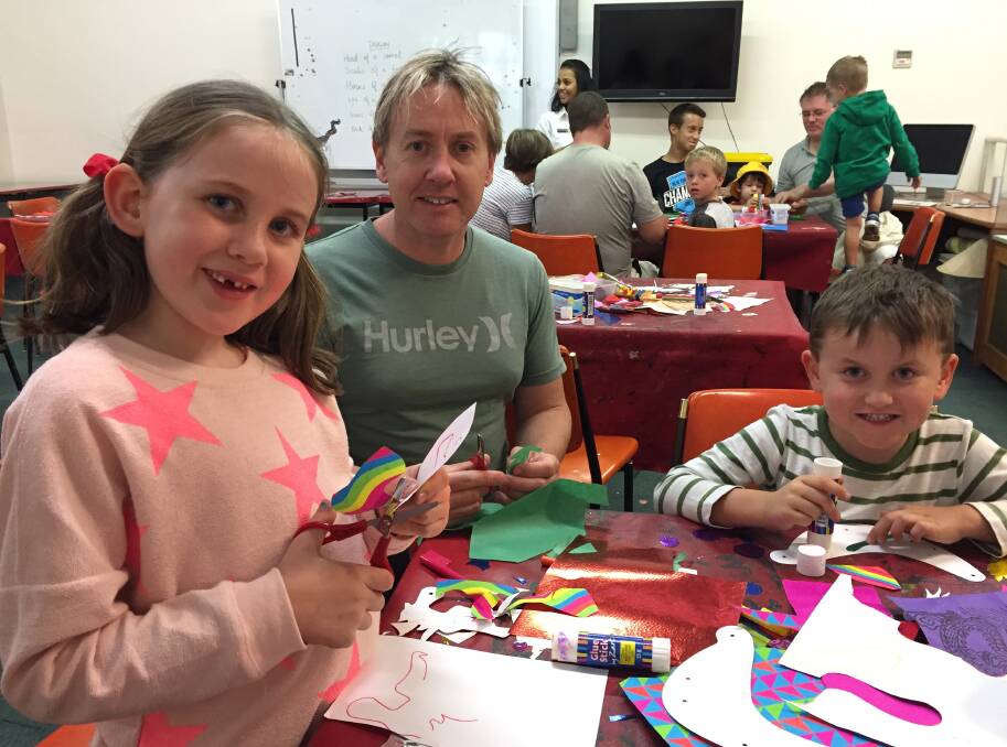 HAPPY: Mackenzie, Alistair and Byron Johnson, from Ararat, make Chinese dragons at the Golden Dragon Museum.  