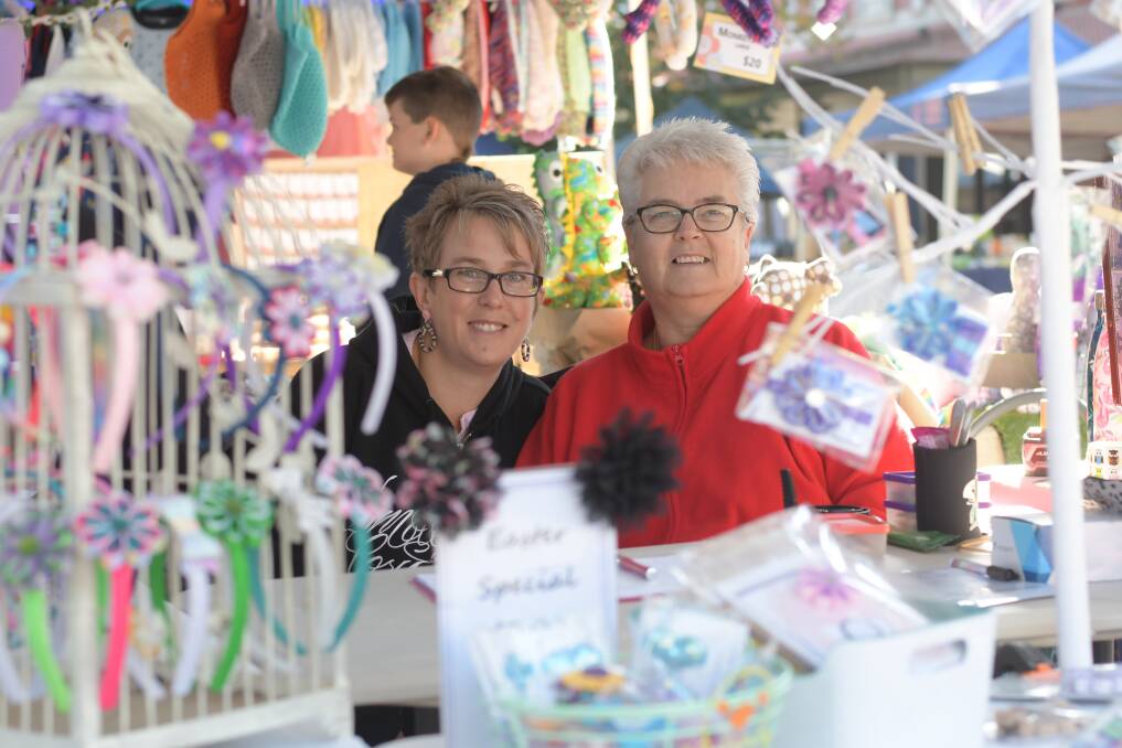 MARKET FUN: Lauren Murphy and Sue Petts at a previous Good Friday market. Picture: NONI HYETT
