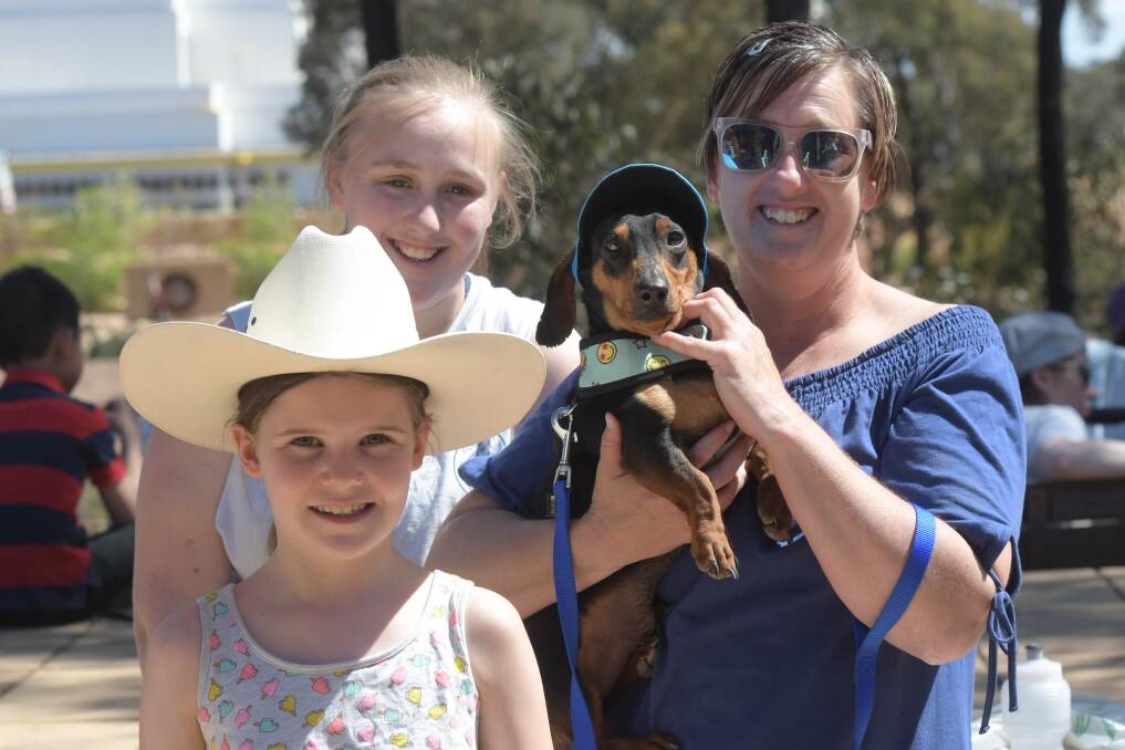 Vegecarian Festival at The Great Stupa in 2018, Millicent Lowery, Jaime Sawers, Nicole Sawer and Louie the dog. Picture: NONI HYETT