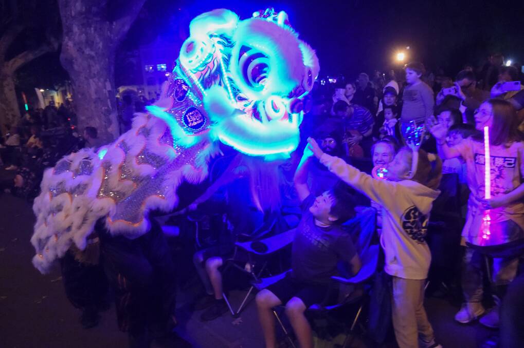 Lion Dancers took part in the 2022 Easter Torchlight Procession. Picture by Darren Howe