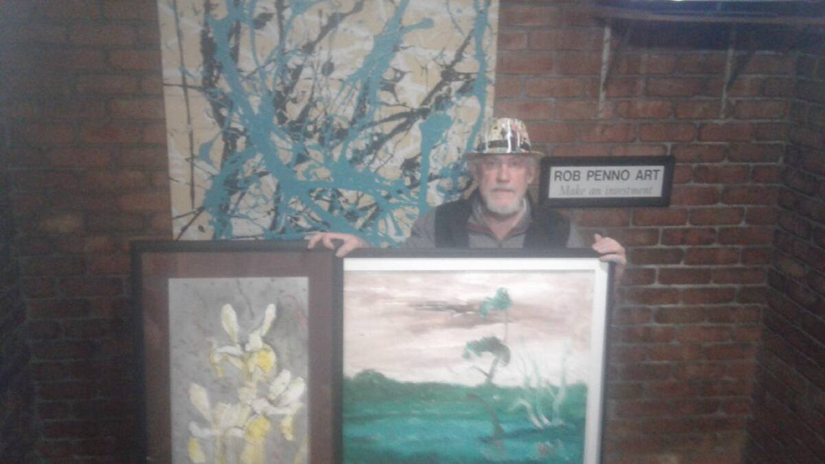 ARTISTIC: Rob Penno featured infront of some of his works. Picture: SUPPLIED.