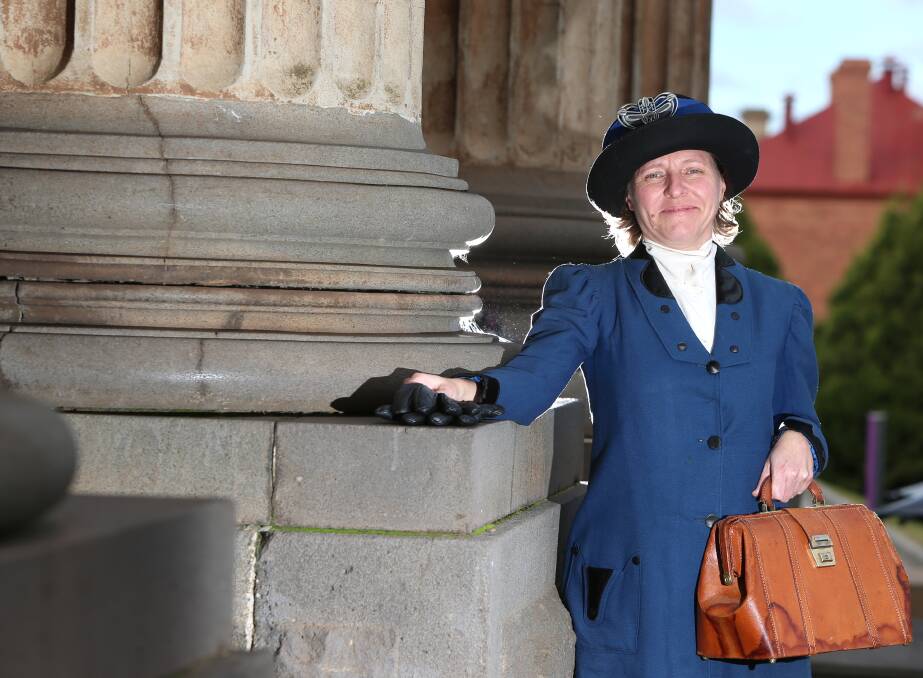 HISTORY: City of Greater Bendigo heritage planner Danielle Orr dressed in a 1916 walking suit from the 2014 exhibition. Picture: GLENN DANIELS.