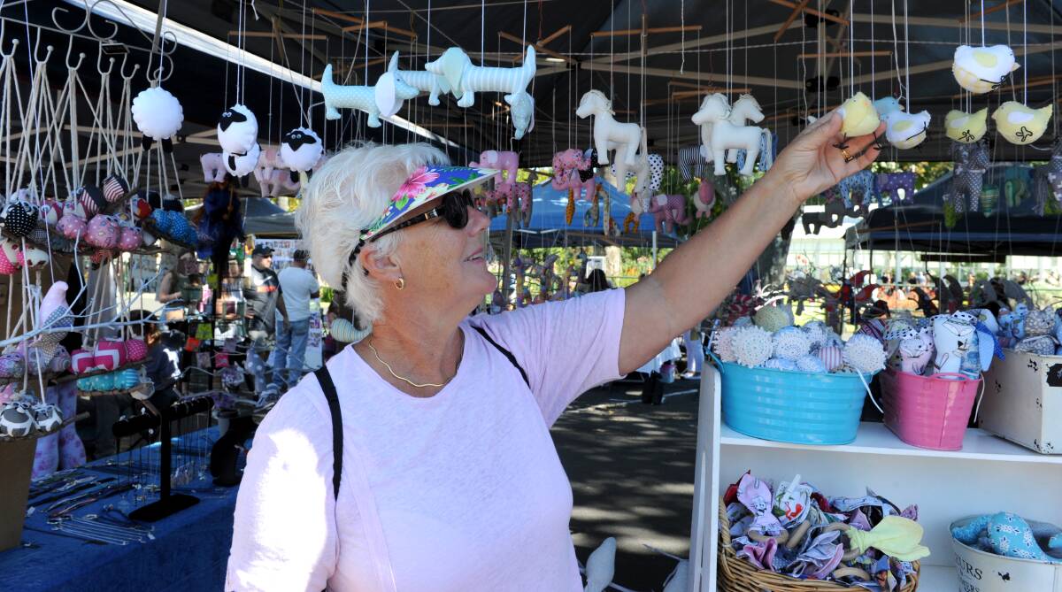 CREATIVE ITEMS: Brenda attends a local market. Picture: NONI HYETT / FILES