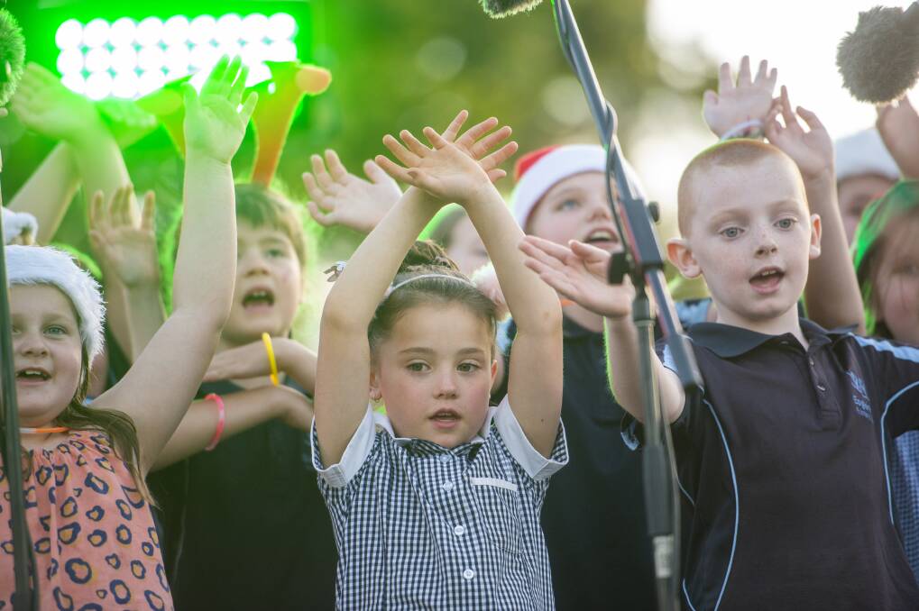 SONG AND DANCE: Students perform at the 2019 Bendigo Christmas Carols. Picture: DARREN HOWE