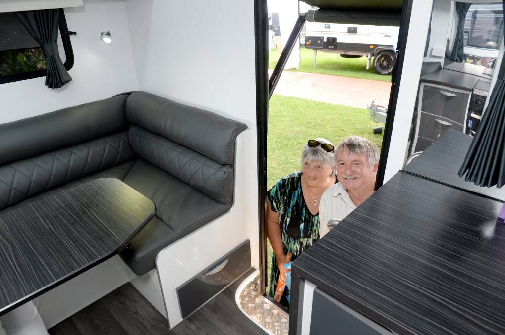 LUXURY OPTIONS: Robyn and Stephen Guy take a close look at one fo the dozens of caravans on disaplay at Bendigo Leisure Fest in 2017. Pictures: DARREN HOWE.