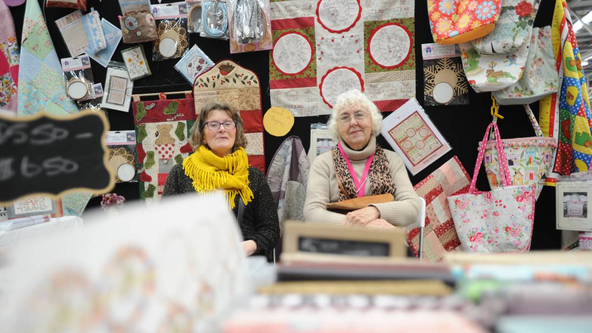 HANDMADE GOODS: Sheena Schmidt and Shirley Wrangler showcase their goods at a market. Picture: NONI HYETT Note: Image taken before 2020