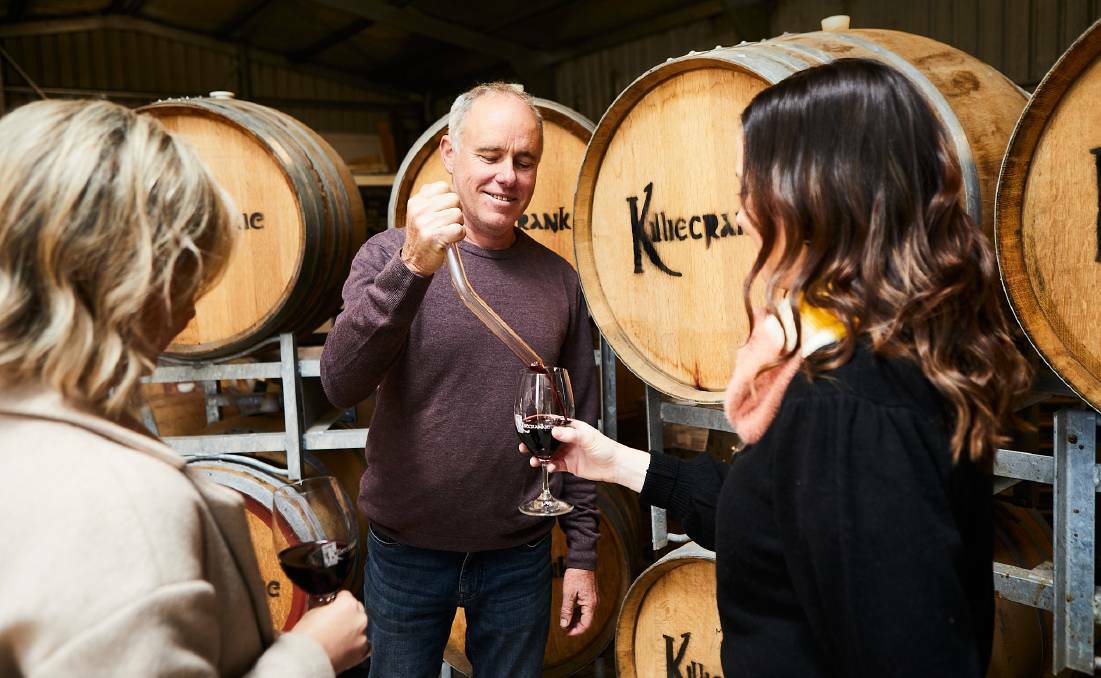 TASTING: John Monteath from Killiecrankie wines hands out some samples straight from the barrel. Picture: SUPPLIED 