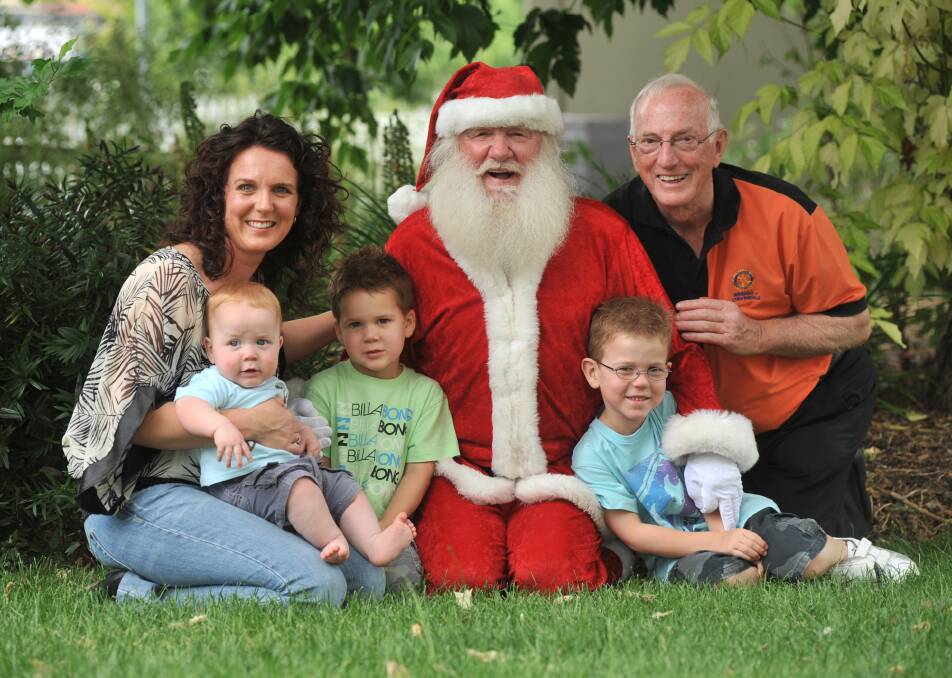 2008: Preparations for the Strathdale Park Community Christmas Carols, Sarah Purcell with Harry, Tom, Will, Santa, and Graeme Chellew. Picture by Brendan McCarthy