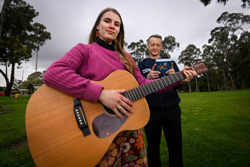 Mariah McCarthy and Colin Thompson with the Bendigo Blues and Roots Festival commemorative album. Picutre by Darren Howe